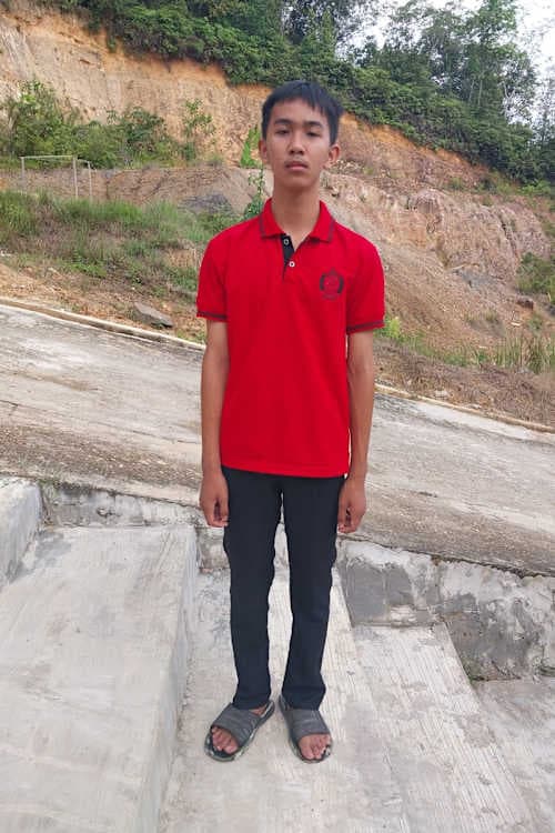 An unsponsored boy named Tenzen from Indonesia who has waited 437 days for a sponsor.
