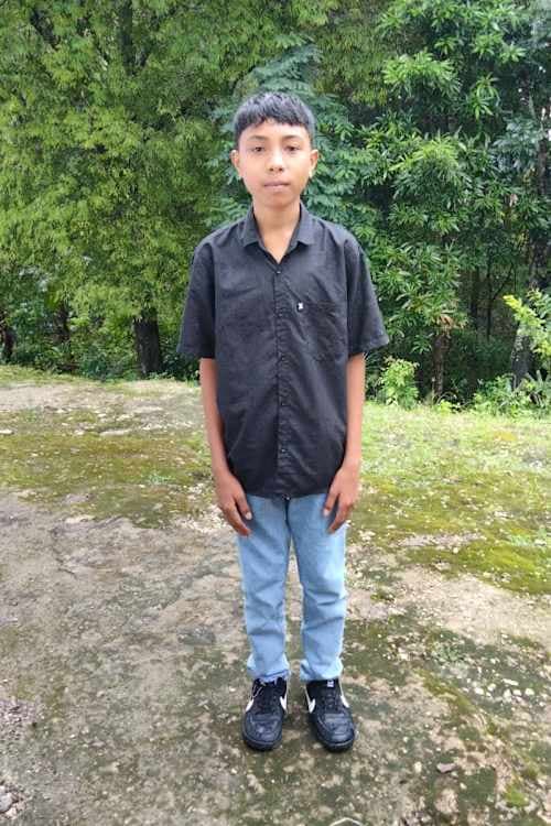 An unsponsored boy named Hengky from Indonesia who has waited 339 days for a sponsor.
