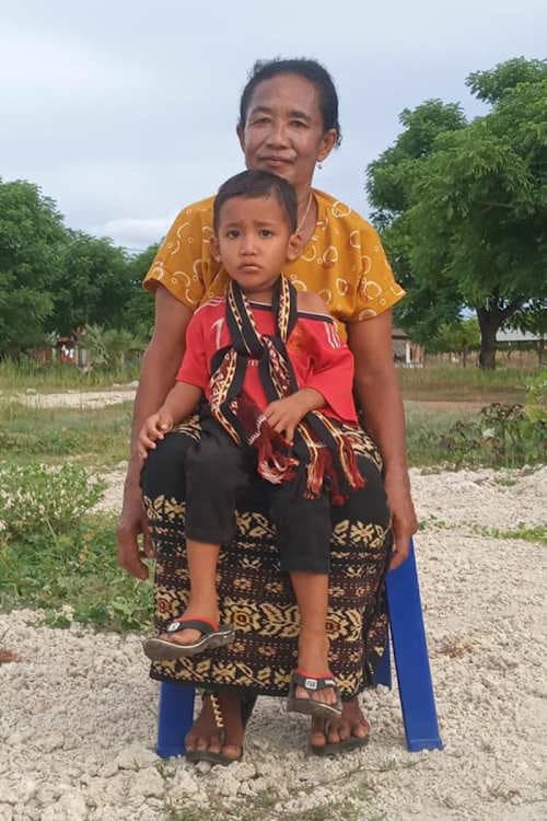 An unsponsored boy named Carlos from Indonesia who has waited 424 days for a sponsor.
