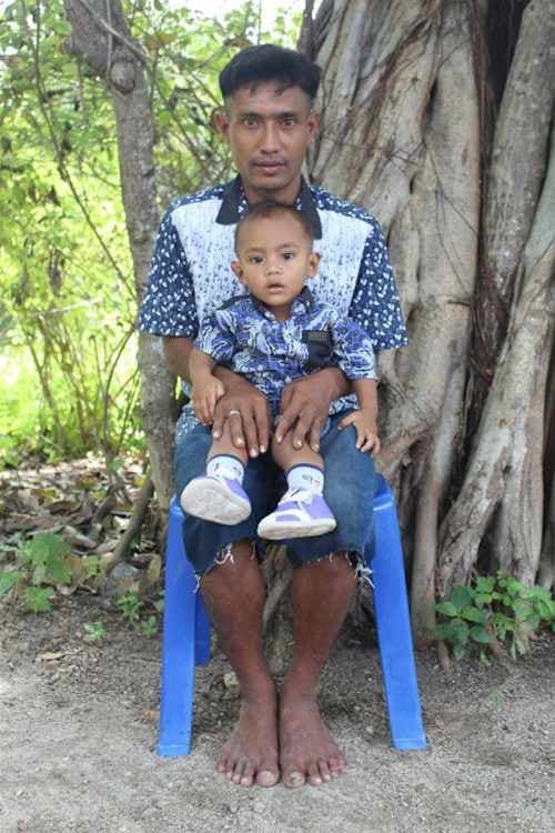 An unsponsored boy named Vino from Indonesia who has waited 505 days for a sponsor.