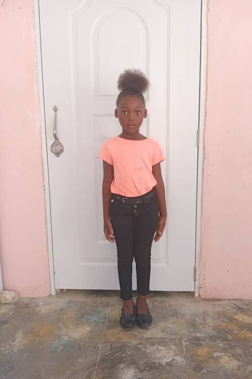 An unsponsored girl named Mirdjina from Haiti who is vulnerable to exploitation and has waited 412 days for a sponsor.