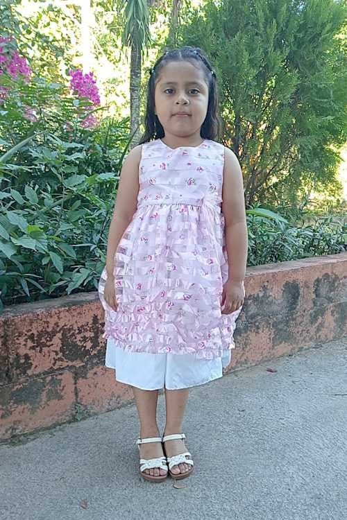 An unsponsored girl named Astrid from El Salvador who has waited 515 days for a sponsor.