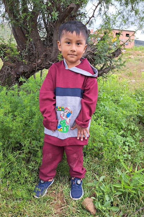 An unsponsored boy named Adriel from Bolivia who has waited 472 days for a sponsor.