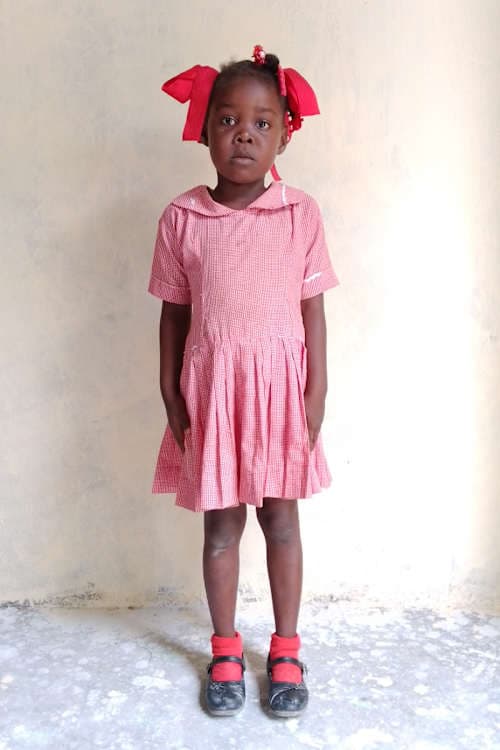 An unsponsored girl named Djelie from Haiti who is vulnerable to exploitation and has waited 409 days for a sponsor.