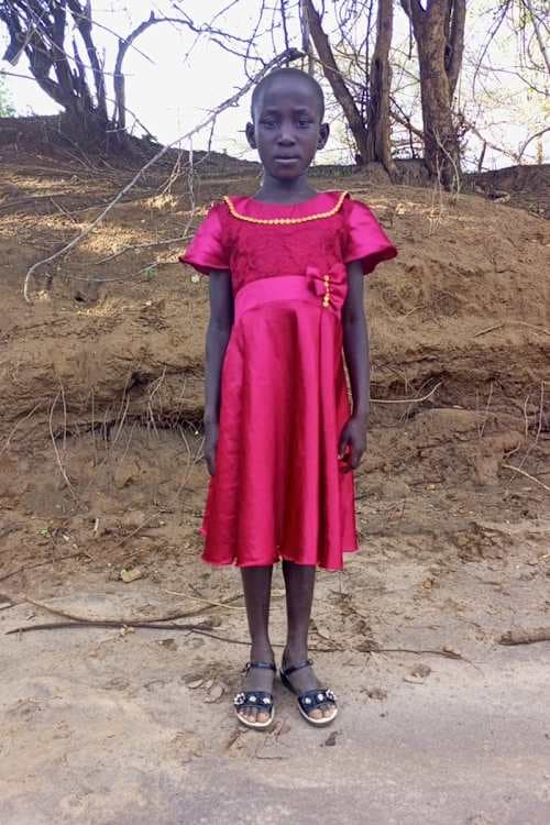 An unsponsored girl named Anna from Uganda who lives in an AIDS-affected area, is vulnerable to exploitation and has waited 512 days for a sponsor.
