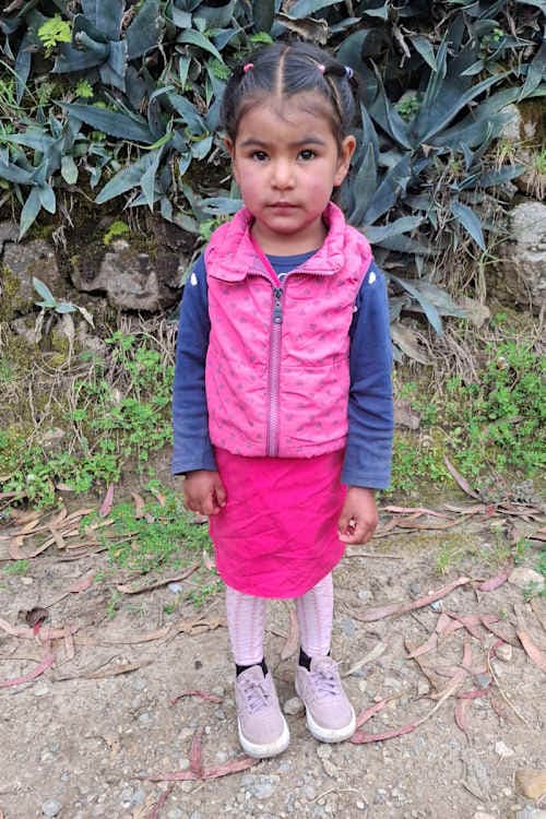 An unsponsored girl named Luana from Peru who has waited 408 days for a sponsor.