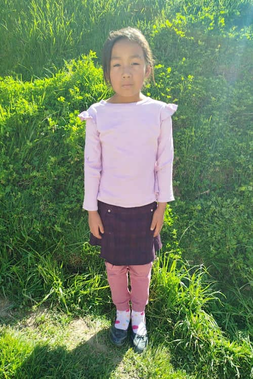 An unsponsored girl named Maidely from Peru who has waited 415 days for a sponsor.