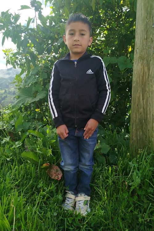 An unsponsored boy named Lian from Peru who has waited 415 days for a sponsor.