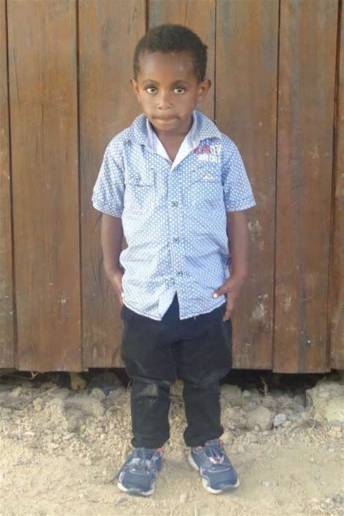 An unsponsored boy named Win from Indonesia who has waited 461 days for a sponsor.