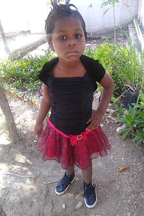 An unsponsored girl named Romana from Haiti who is vulnerable to exploitation and has waited 715 days for a sponsor.