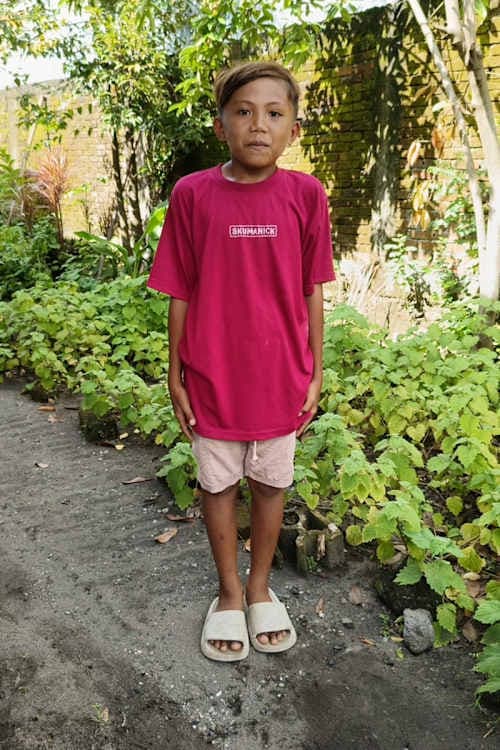 An unsponsored boy named Theo from Indonesia who has waited 560 days for a sponsor.