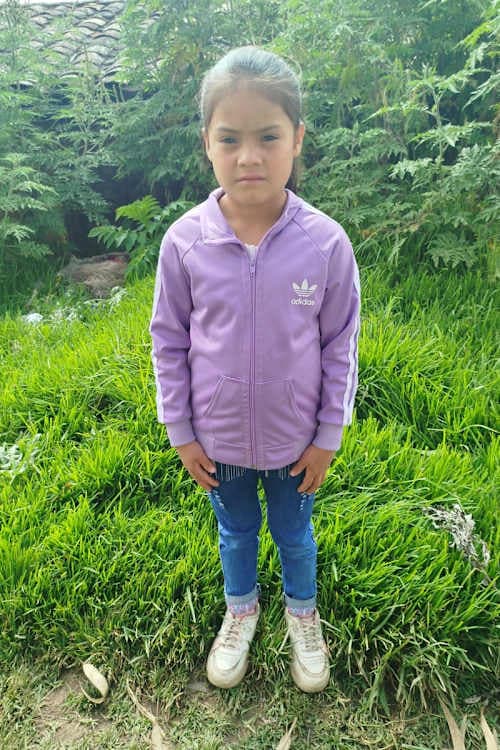 An unsponsored girl named Xiomara from Peru who has waited 408 days for a sponsor.