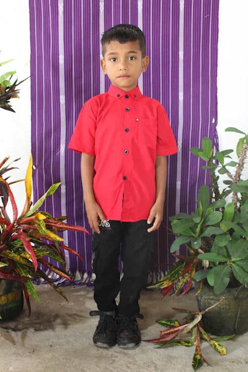 An unsponsored boy named Gilber from Indonesia who has waited 518 days for a sponsor.