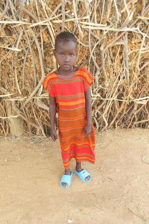 An unsponsored girl named Loyce from Kenya who lives in an AIDS-affected area and has waited 400 days for a sponsor.