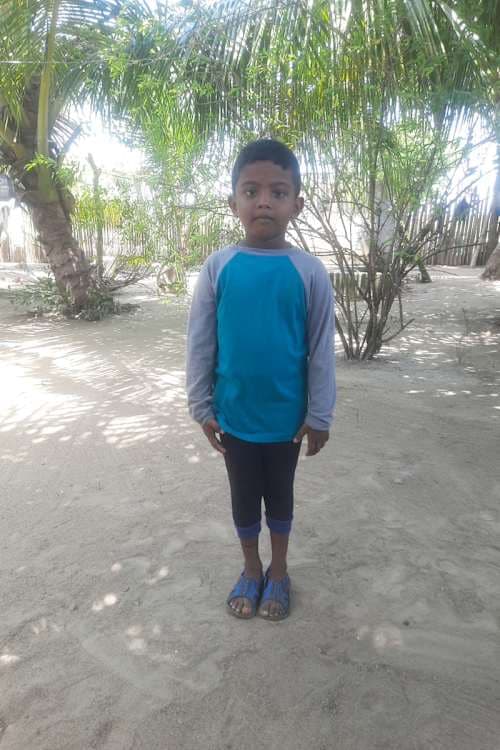 An unsponsored boy named Varunraj from Sri Lanka who has waited 572 days for a sponsor.