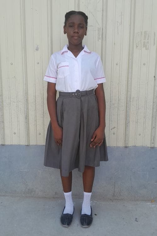 An unsponsored girl named Mickneia Eunice from Haiti who is vulnerable to exploitation and has waited 659 days for a sponsor.