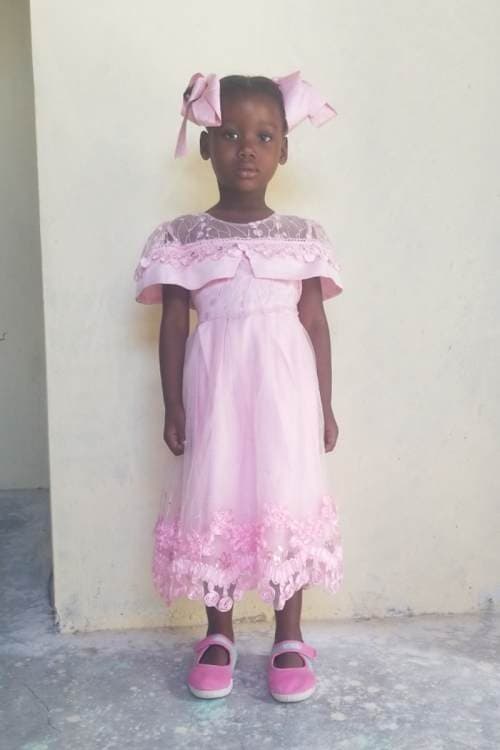 An unsponsored girl named Neïssa from Haiti who is vulnerable to exploitation and has waited 402 days for a sponsor.
