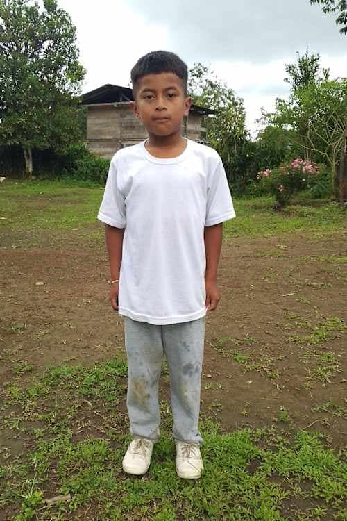 An unsponsored boy named Cristopher from Ecuador who has waited 458 days for a sponsor.