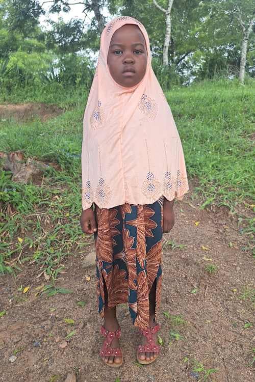 An unsponsored girl named Nusran from Tanzania who lives in an AIDS-affected area, is vulnerable to exploitation and has waited 388 days for a sponsor.