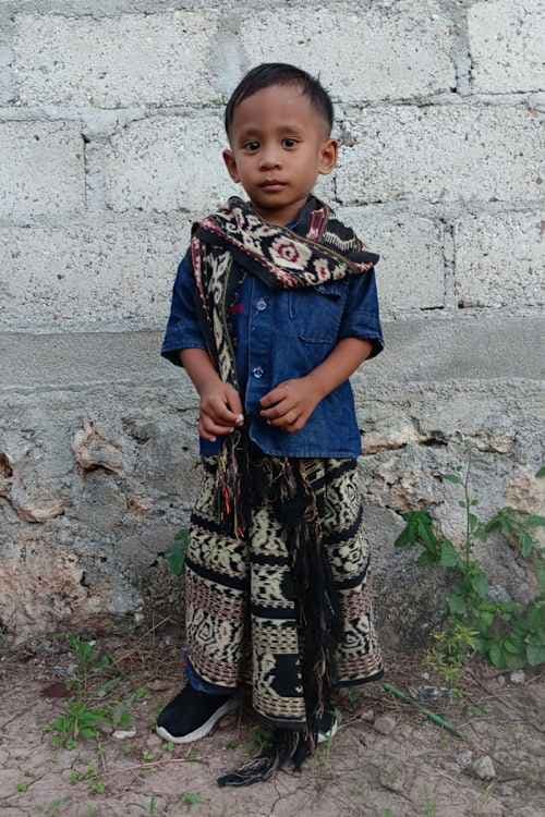 An unsponsored boy named Jovin from Indonesia who has waited 425 days for a sponsor.
