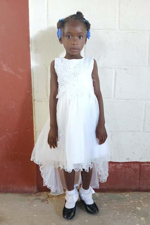 An unsponsored girl named Lili from Haiti who is vulnerable to exploitation and has waited 501 days for a sponsor.