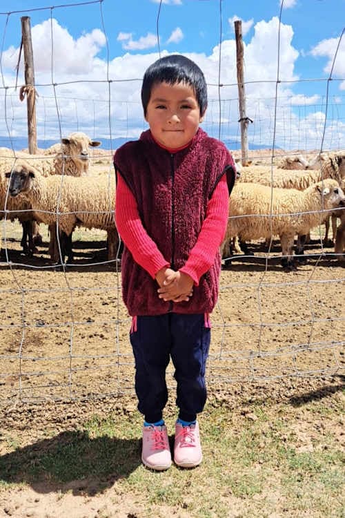 An unsponsored girl named Genesis from Bolivia who has waited 384 days for a sponsor.