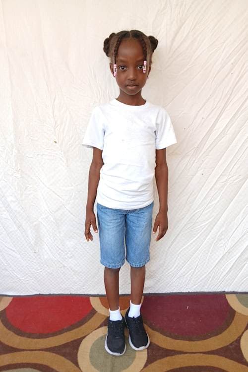 An unsponsored girl named Dayou from Haiti who is vulnerable to exploitation and has waited 492 days for a sponsor.