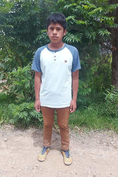 An unsponsored boy named Elvis from Bolivia who has waited 107 days for a sponsor.