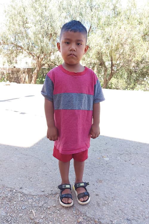 An unsponsored boy named Jhamil Esteban from Bolivia who has waited 599 days for a sponsor.