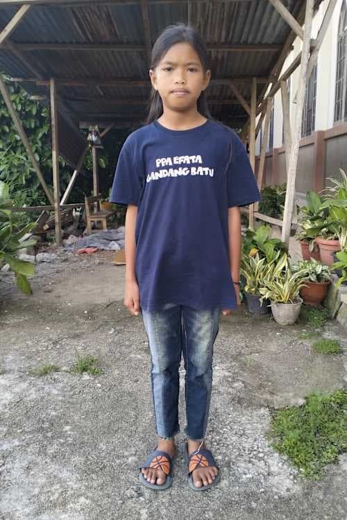 An unsponsored girl named Wila from Indonesia who has waited 211 days for a sponsor.
