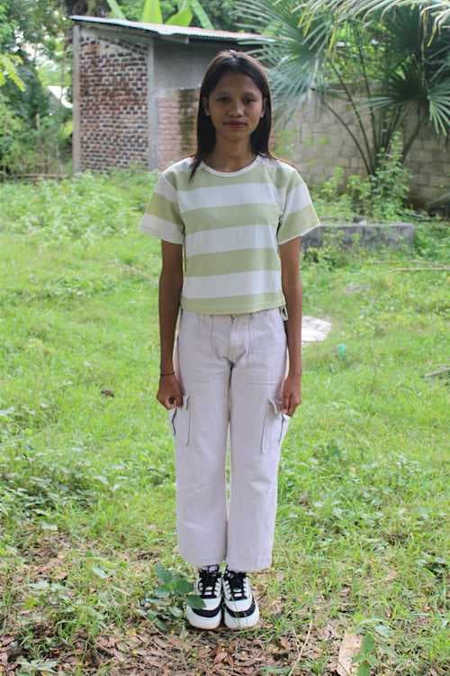 An unsponsored girl named Elsi from Indonesia who has waited 446 days for a sponsor.