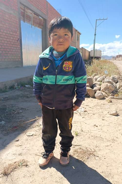 An unsponsored boy named Thiago from Bolivia who has waited 392 days for a sponsor.