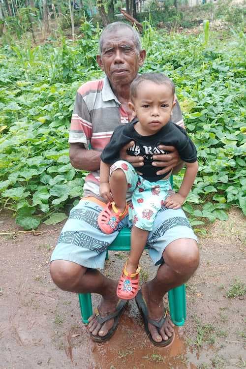 An unsponsored boy named El from Indonesia who has waited 428 days for a sponsor.