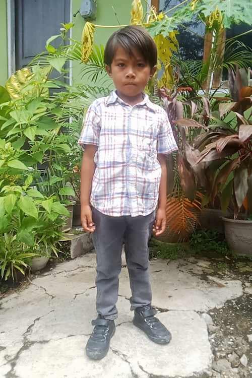 An unsponsored boy named Riski from Indonesia who has waited 434 days for a sponsor.
