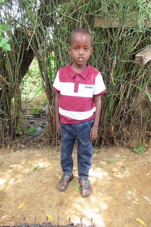 An unsponsored boy named Malicha from Kenya who lives in an AIDS-affected area and has waited 385 days for a sponsor.