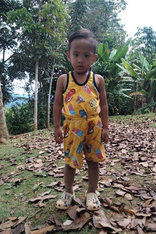 An unsponsored boy named Ar-ar from Philippines who has waited 387 days for a sponsor.