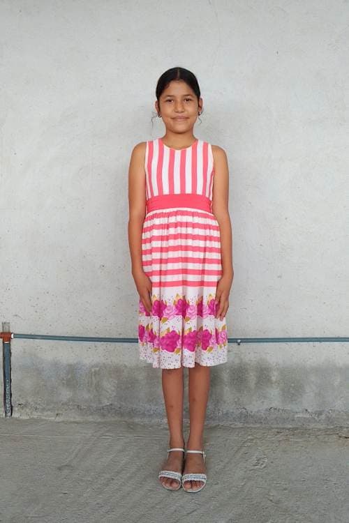 An unsponsored girl named Thais from Ecuador who has waited 422 days for a sponsor.