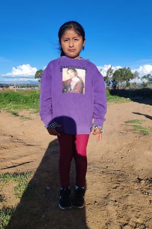 An unsponsored girl named Grissell from Bolivia who has waited 460 days for a sponsor.