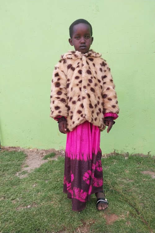 An unsponsored girl named Nashangai from Kenya who lives in an AIDS-affected area and has waited 380 days for a sponsor.
