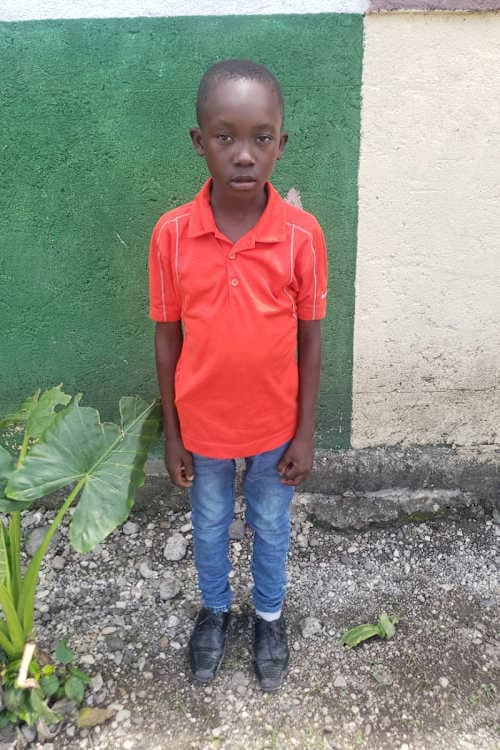 An unsponsored boy named Marc from Haiti who is vulnerable to exploitation and has waited 540 days for a sponsor.
