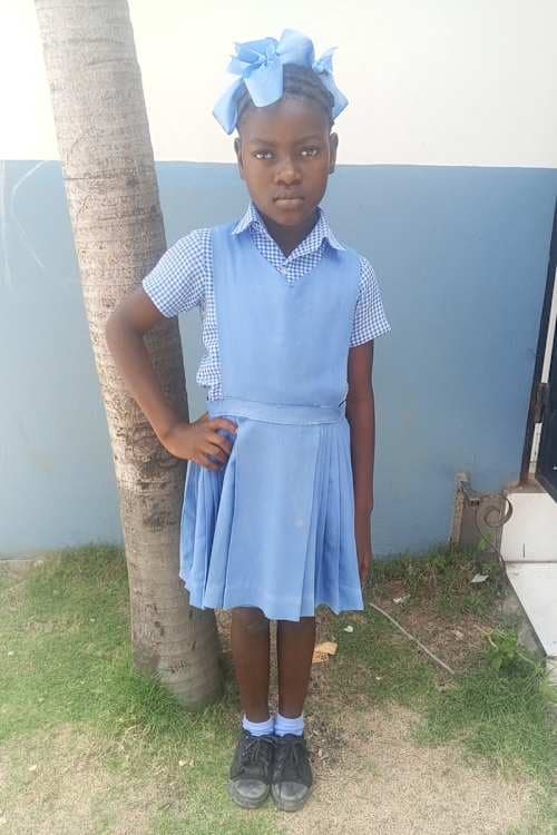 An unsponsored girl named Ornelus from Haiti who is vulnerable to exploitation and has waited 570 days for a sponsor.