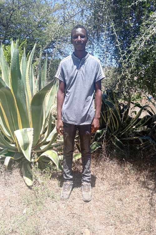 An unsponsored boy named Alex from Kenya who lives in an AIDS-affected area and has waited 293 days for a sponsor.