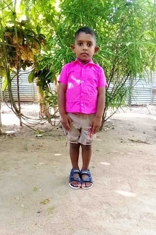 An unsponsored boy named Sujan from Sri Lanka who has waited 367 days for a sponsor.
