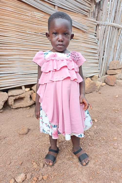 An unsponsored girl named Benie from Togo who lives in an AIDS-affected area, is vulnerable to exploitation and has waited 430 days for a sponsor.