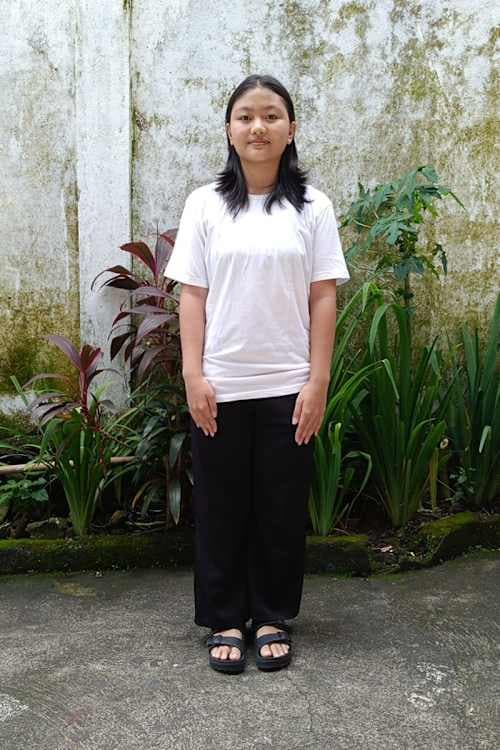 An unsponsored girl named Eca from Indonesia who has waited 187 days for a sponsor.