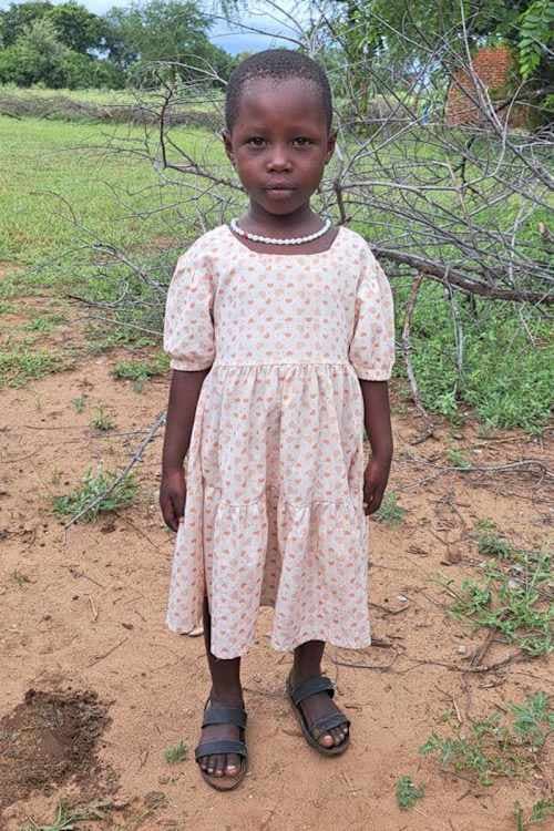 An unsponsored girl named Nembulisi from Tanzania who lives in an AIDS-affected area, is vulnerable to exploitation and has waited 406 days for a sponsor.
