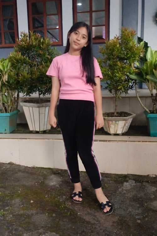 An unsponsored girl named Yeslin from Indonesia who has waited 204 days for a sponsor.