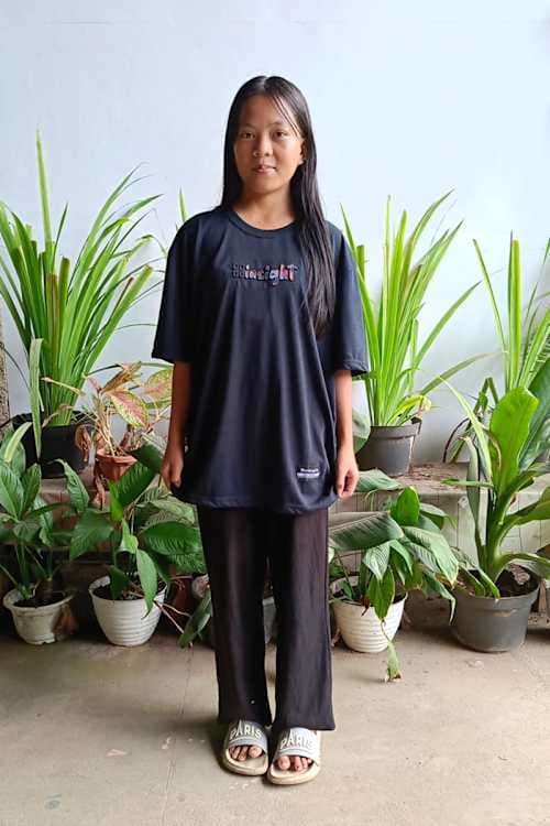 An unsponsored girl named Injil from Indonesia who has waited 163 days for a sponsor.