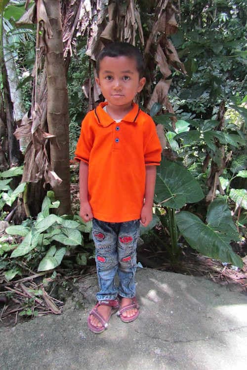 An unsponsored boy named Arya from Indonesia who has waited 422 days for a sponsor.