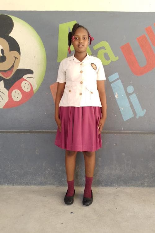 An unsponsored girl named Ker-Djinie from Haiti who is vulnerable to exploitation and has waited 799 days for a sponsor.
